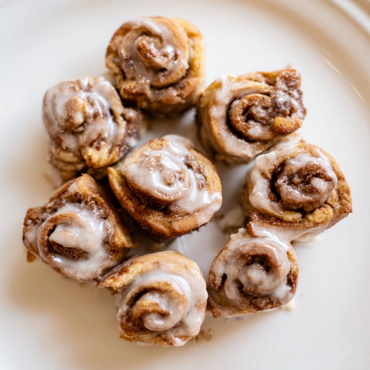 Easy homemade Cinnamon Roll Bites: enjoy these warm, glazed sweets with coffee.