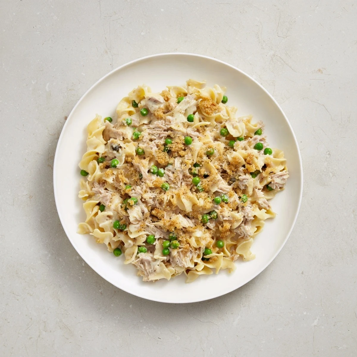 Golden, bubbly Creamy Tuna Noodle Casserole with a crispy Ritz cracker topping—a comforting family meal.