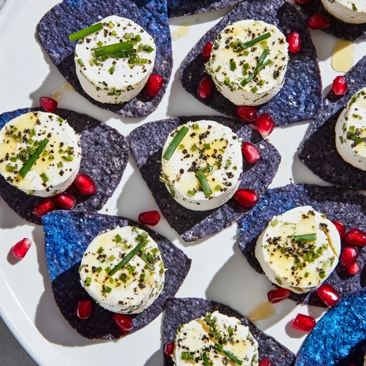 Inviting photo: The Stepping Stones cheese appetizer featuring a playful arrangement of cheese on blue corn chips.