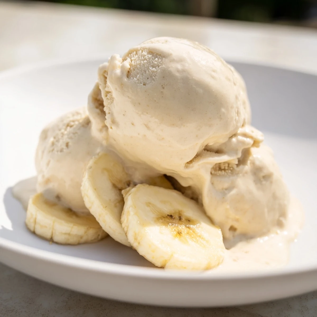 Cool and delicious: Imagine a bowl of homemade 2-Ingredient Banana Ice Cream with its vibrant texture.