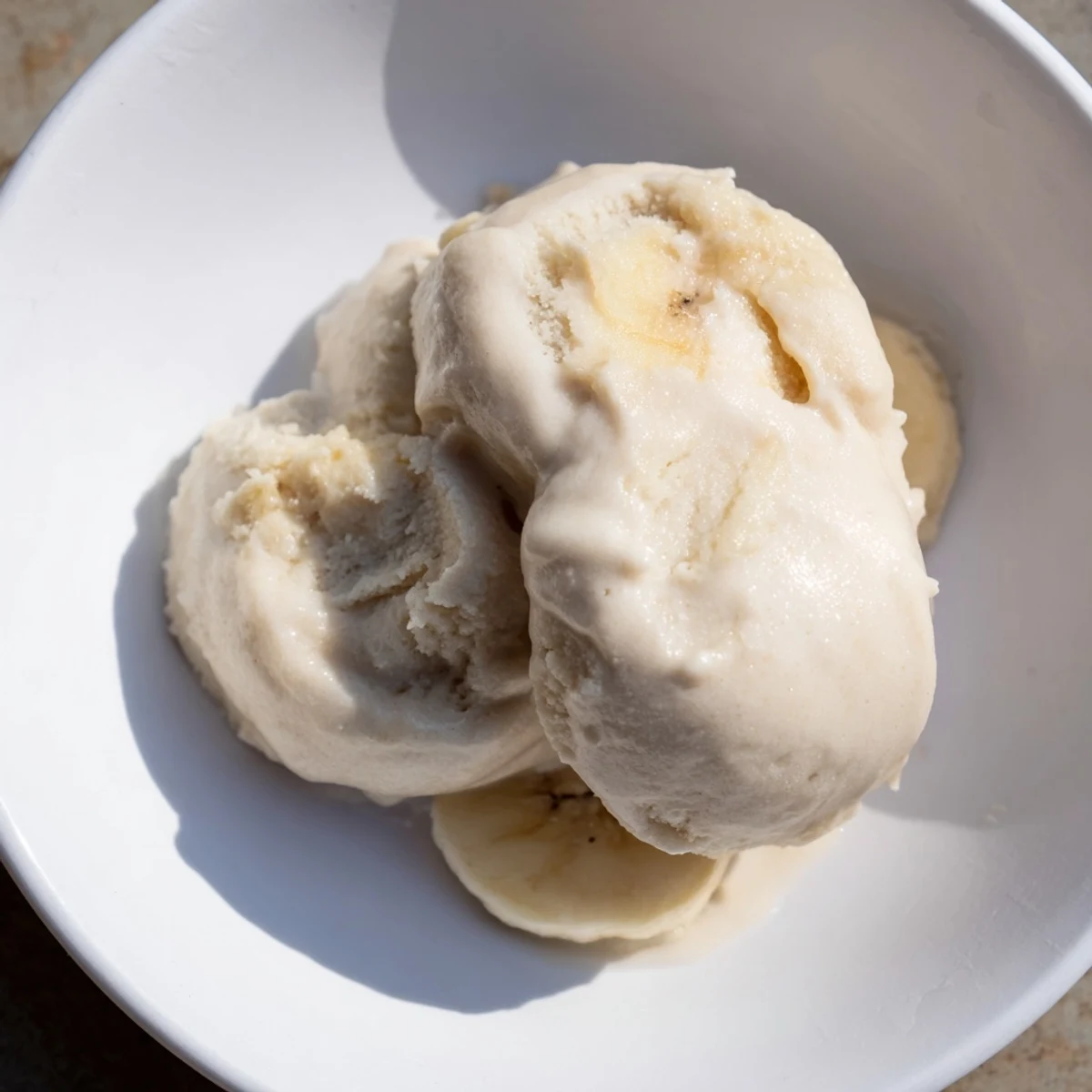 Frozen banana blended with milk—this 2-Ingredient Banana Ice Cream is a simple, delicious treat!