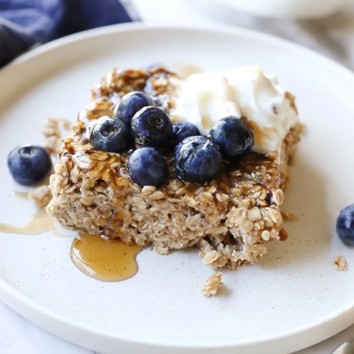 Visualize a golden, cake-like Protein Pancake Oats slice, perfect for a filling, high-protein breakfast.