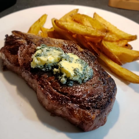 Juicy Steakhouse Garlic Butter Steak & Fries, seared to perfection and topped with decadent herb butter.