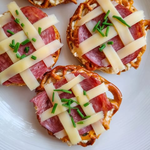 Appealing The Lattice Window appetizer, a delightful arrangement of pretzel lattice over savory meats and cheese.