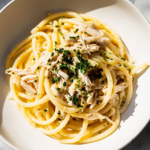 Golden, glistening Simple Garlic Butter Bucatini with tender chicken, a satisfying Italian-inspired meal.