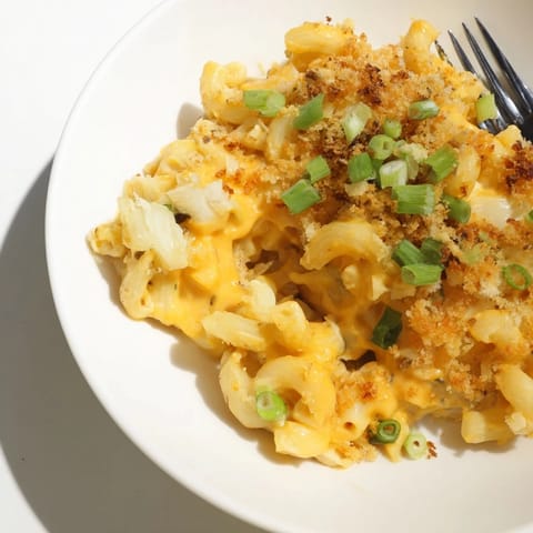 Warm, flavorful Japanese Curry Pumpkin Mac showcasing a vibrant orange hue.  